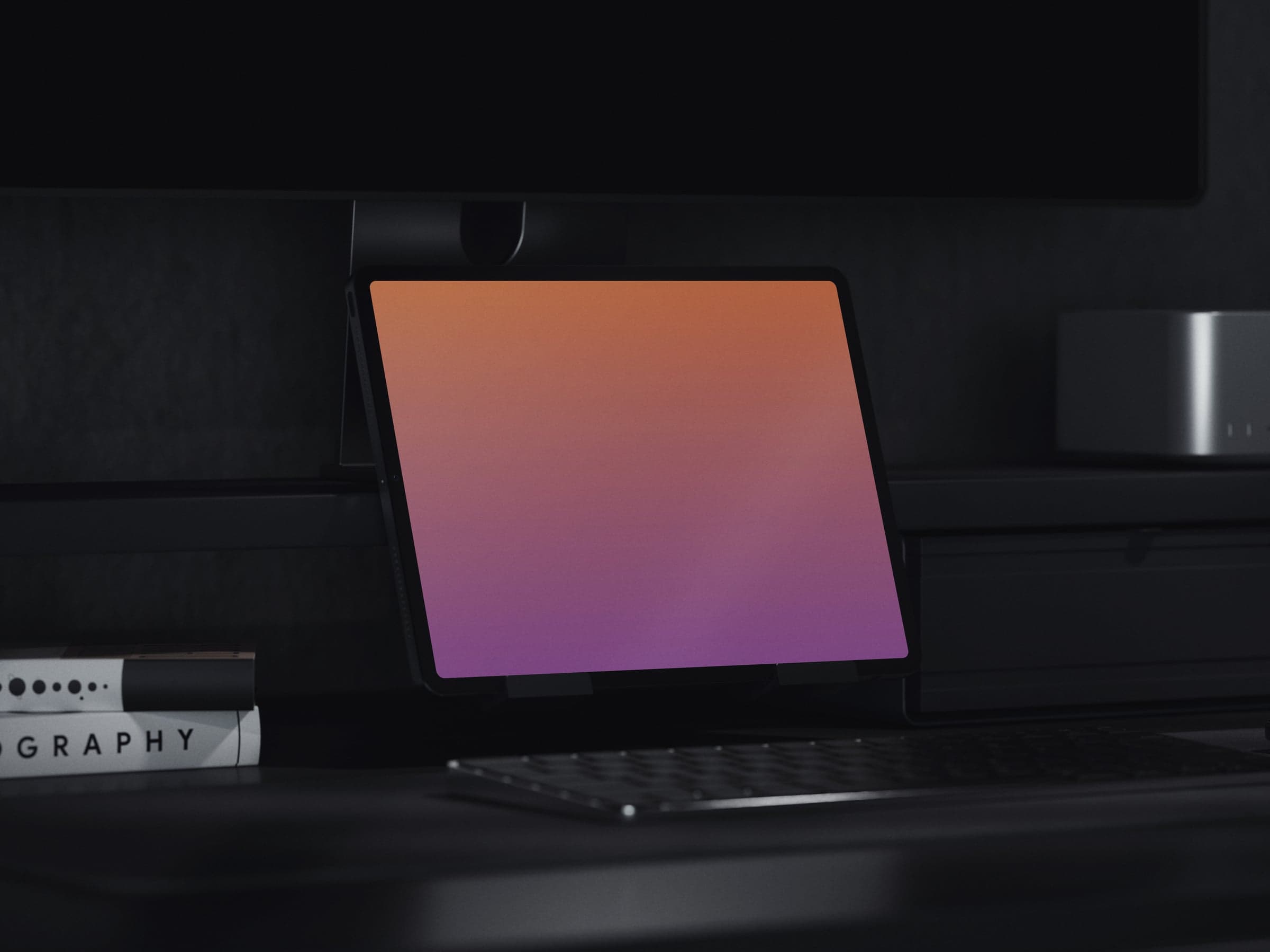 NOIR 10 Tablet resting on dark minimal desk mockup preview