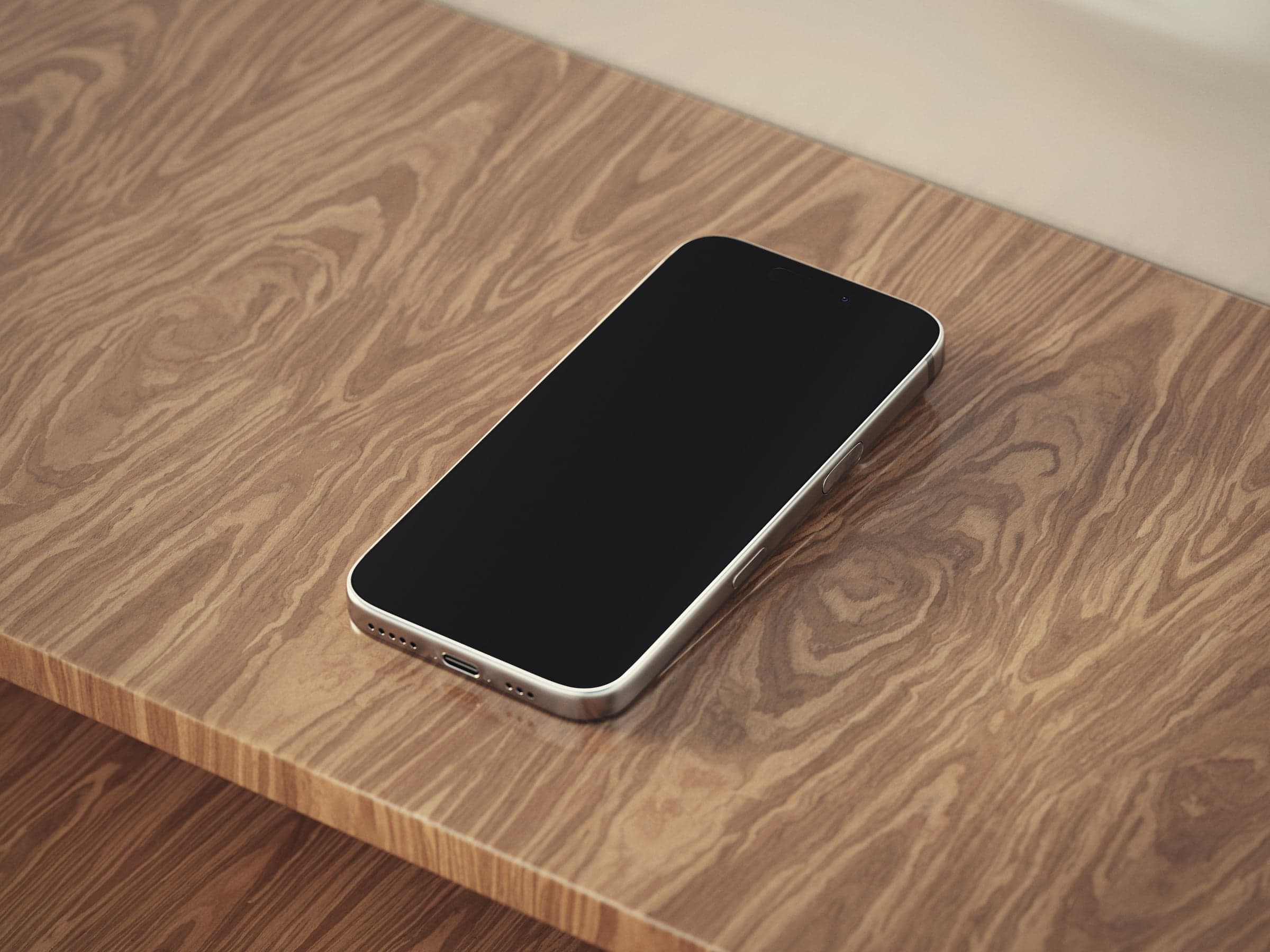 OAK 05 iPhone lying on an oak desk mockup preview