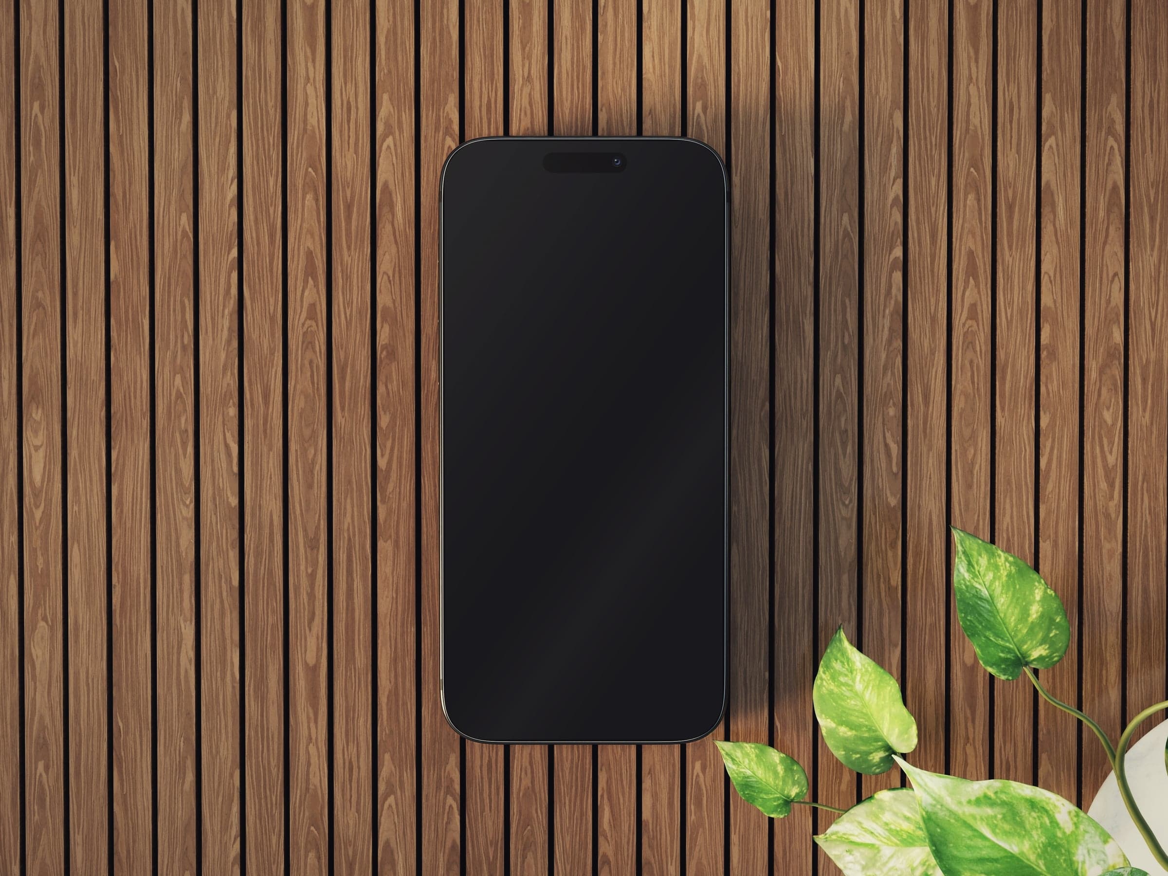 OAK 03 iPhone flat lay on slatted oak with leaves mockup preview